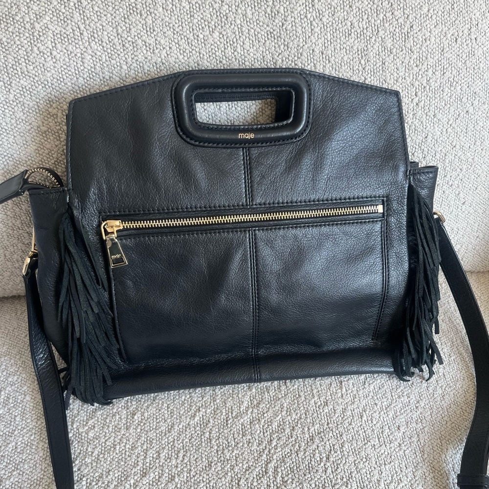 Medium sized black leather Maje bag